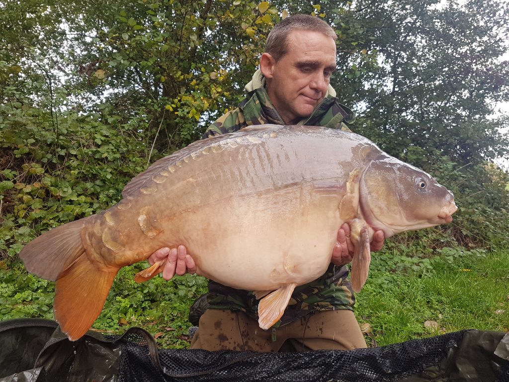 One of the big carp I'm holding from Yeomans Lake