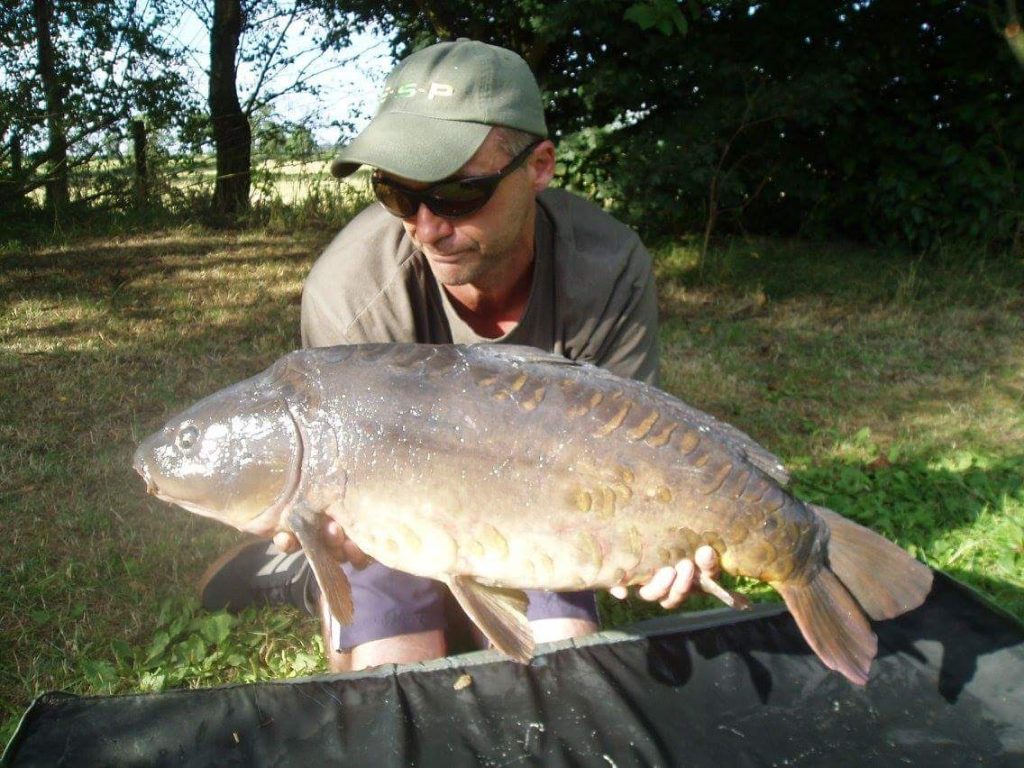Carp caught using a PVA stringer with boilies